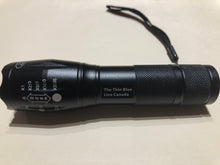 Load image into Gallery viewer, Spring / Summer Promo: With each order of $99.99 and over (pre tax) you will receive  an Official Thin Blue Line Canada Tactical Flashlight 🔦 Kit
(a $59.99 value) absolutely FREE (Must add flashlight kit to cart and enter promo code BRIGHT at check out)